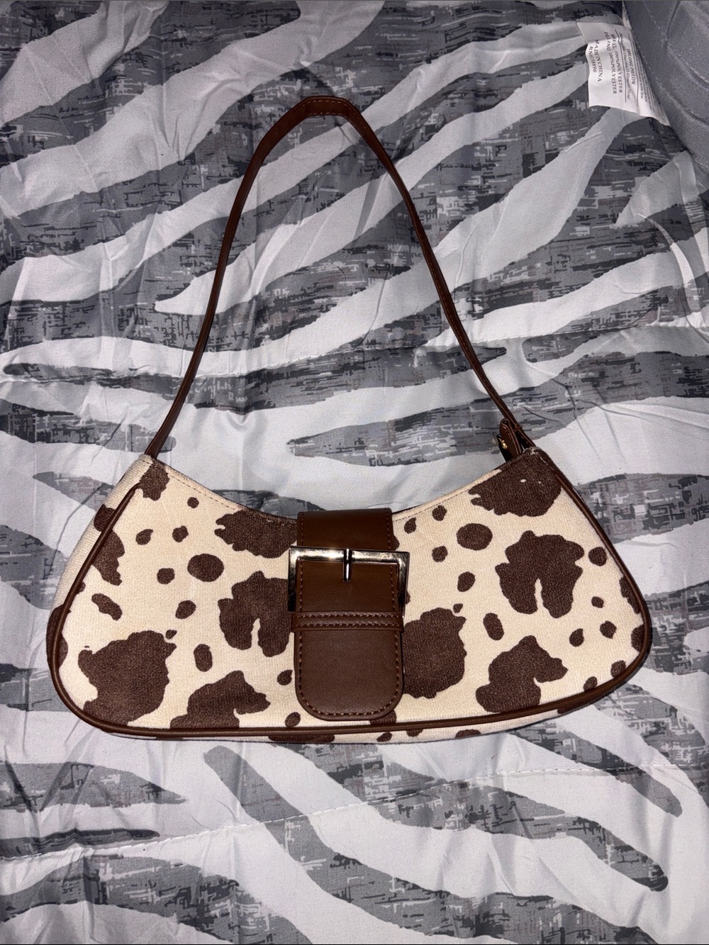Brown Cow-Print Shoulder Bag with Buckle Detail